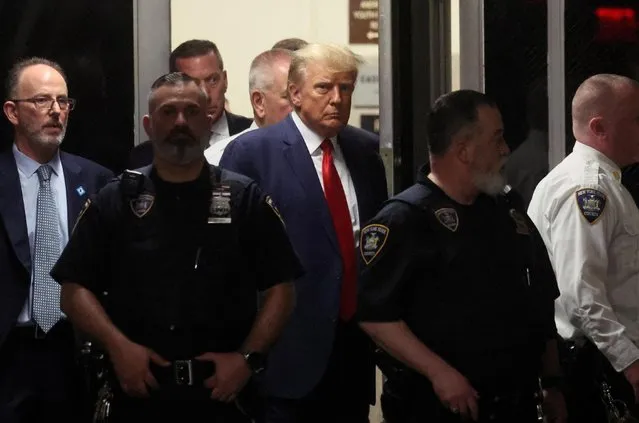 Former U.S. President Donald Trump arrives at Manhattan Criminal Courthouse, after his indictment by a Manhattan grand jury following a probe into hush money paid to p*rn star Stormy Daniels, in New York City, U.S., April 4, 2023. (Photo by Brendan McDermid/Reuters)