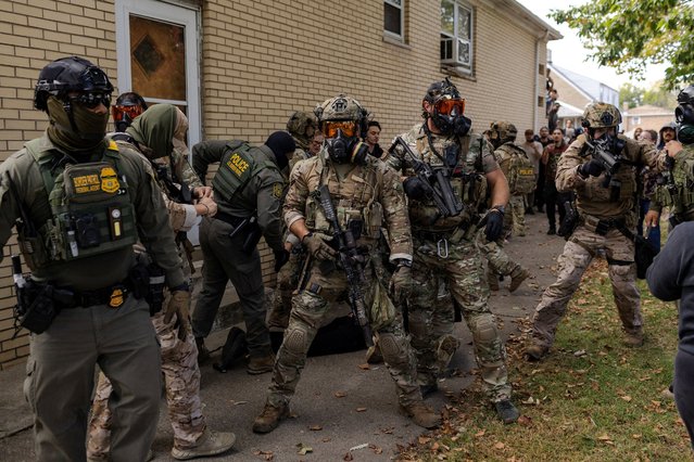 Federal agents detain a man after clashes on Chicago's South Side, on October 14, 2025. (Photo by Jim Vondruska/Reuters)