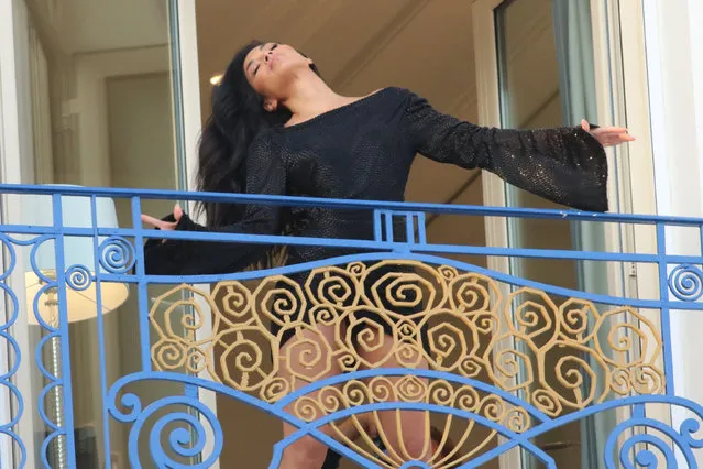 Photoshooting at Hotel Martinez on a balcony with American singer Nicole Scherzinger and Greg Williams in Cannes, France on May 16. 2018. (Photo by Pierre Teyssot/Splash News and Pictures)