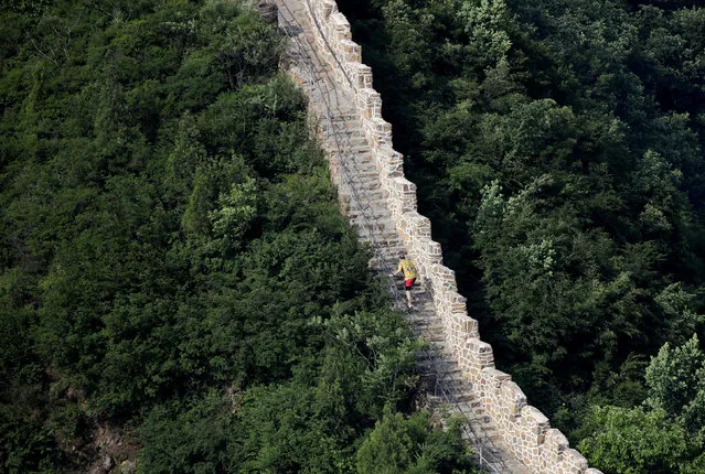 A participant runs the Great Wall Marathon at the Huangyaguan section of the Great Wall of China, in Jixian of Tianjin, China May 19, 2018. (Photo by Jason Lee/Reuters)