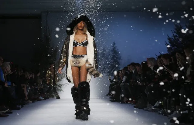 Model Jourdan Dunn presents a creation from the Moschino Autumn/Winter 2015 collection during “London Collections: Men” in London January 11, 2015. “London Collections: Men” is a four-day showcase of men's fashion scheduled a month before London Fashion week. (Photo by Suzanne Plunkett/Reuters)