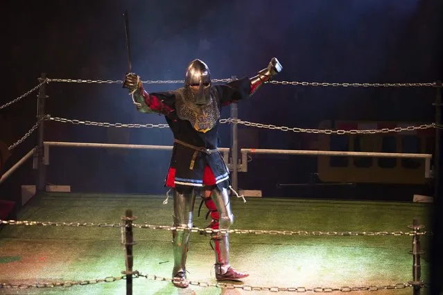 An Estonian competitor cheers during the “World Medieval Fighting Championship – the Israeli Challenge” in Rishon Letzion near Tel Aviv January 22, 2015. Israel hosted the tournament on Thursday, which includes 14 competitors from seven different countries – France, Belarus, Denmark, Estonia, Russia, Ukraine and Israel. (Photo by Amir Cohen/Reuters)