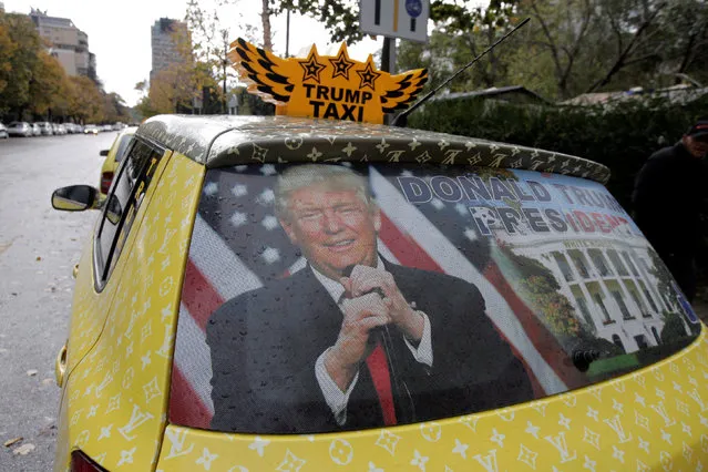 A car belonging to taxi driver Uljan Kolgjegja is decorated with a picture of  Republican presidential nominee Donald Trump celebrating his victory in the U.S. elections, in Tirana, Albania November 10, 2016. (Photo by Florion Goga/Reuters)