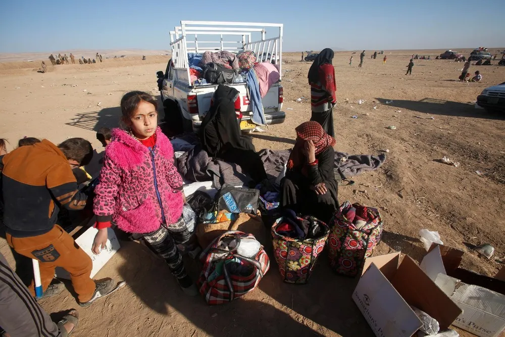 Iraqis Flee Mosul Fighting