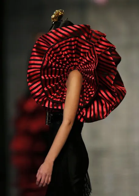 A model presents a creation by Vicky Martin Berrocal during the International Flamenco Fashion Show SIMOF in the Andalusian capital of Seville February 5, 2015. (Photo by Marcelo del Pozo/Reuters)