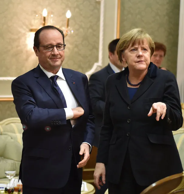 Germany's Chancellor Angela Merkel and France's President Francois Hollande attend a meeting on resolving the Ukrainian crisis in Minsk, February 11, 2015. (Photo by Mykola Lazarenko/Reuters)