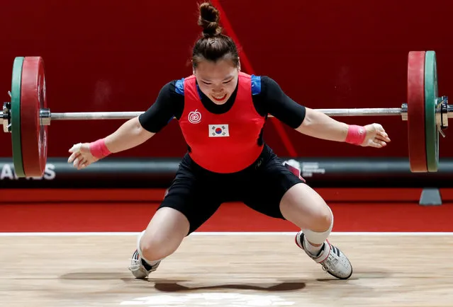 South Korea' s Eunji Ham during the women' s 58 kg weightlifting at the 18 th Asian Games in Jakarta, Indonesia, Thursday, August 23, 2018. (Photo by Reuters/Beawiharta)