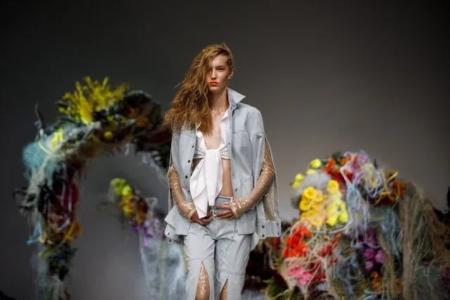 A model presents a creation by Fyodor Golan at the London Fashion Week, in London, Britain, 15 September 2018. (Photo by Tolga Akmen/EPA/EFE)