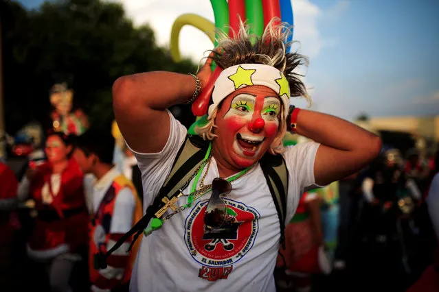 A clown participates in a parade during Salvadoran Clown Day celebrations in San Salvador, El Salvador,  December 7, 2016. (Photo by Jose Cabezas/Reuters)