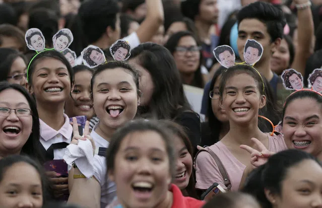 Filipino fans line up for the One Direction concert Saturday, March 21, 2015 in the suburban Pasay city south of Manila, Philippines. (Photo by Bullit Marquez/AP Photo)