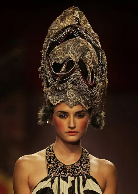 A model displays a creation by JJ Valaya during the Amazon India Fashion Week in New Delhi, India, Wednesday, March 25, 2015. (Photo by Altaf Qadri/AP Photo)