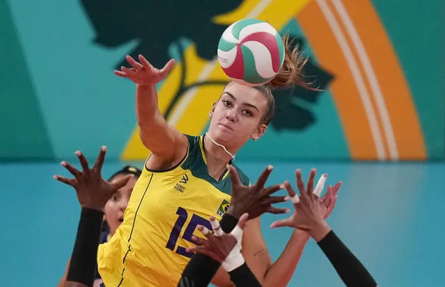 Brazil's Helena Wenk spikes the ball against the Dominican Republic during the women's volleyball gold medal match at the Pan American Games in Santiago, Chile, Thursday, October 26, 2023. (Photo by Silvia Izquierdo/AP Photo)