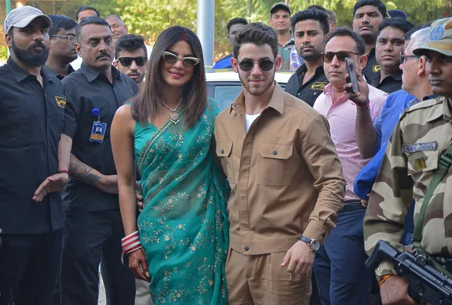 Bollywood actress Priyanka Chopra and her husband singer Nick Jonas pose outside the airport in Jodhpur in the desert state of Rajasthan, December 3, 2018. (Photo by Reuters/Stringer)