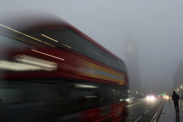 A bus crosses Westminster Bridge on a foggy morning in central London, Britain December 30, 2016. (Photo by Stefan Wermuth/Reuters)