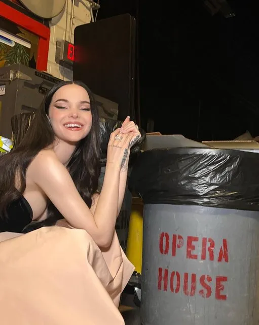 American singer and actress Dove Cameron in the first decade of December 2023 poses next to a trash bin post-performance at the Kennedy Center. (Photo by Dovecameron/Instagram)