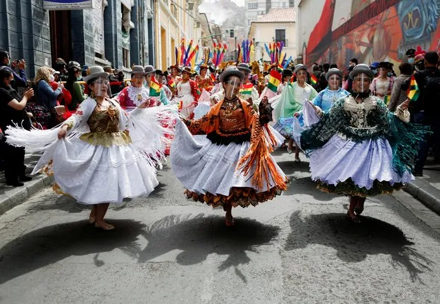 Dancers perform during the Morenada dance national day in La Paz, Bolivia, September 7, 2021. (Photo by Manuel Claure/Reuters)