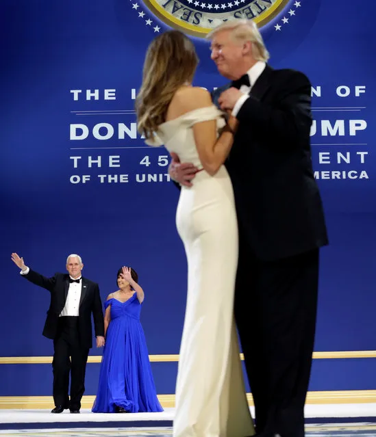 U.S. President Donald Trump dances with his wife Melania as Vice President Mike Pence with his wife Karen wave at the Armed Services Ball in Washington, U.S., January 20, 2017. (Photo by Yuri Gripas/Reuters)
