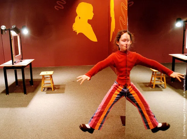 Hannah Pasternak, a student at Smith Elementary School in Tenafly, New Jersey appears to hover in space by using a combination of mirrors  January 29, 2004 at The American Museum of Natural History in New York City