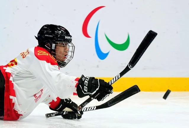 Tian Jintao of China in action during Para Ice Hockey preliminary Group B Italy v China match at Beijing 2022 Winter Paralympic Games in Beijing, China on March 8, 2022. (Photo by Aly Song/Reuters)