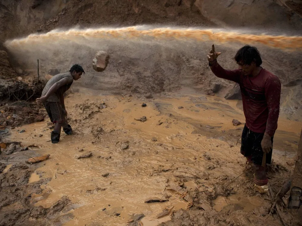 Gold Miners in Peru