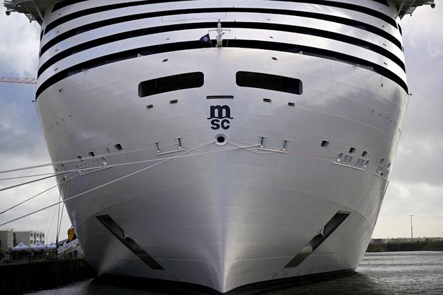 This photograph taken on October 24, 2022, shows a view of the Ocean liner MSC World Europa, equipped with a liquified natural gas (LNG) propulsion system, during its delivery ceremony at Saint-Nazaire's harbour, western France. (Photo by Damien Meyer/AFP Photo)