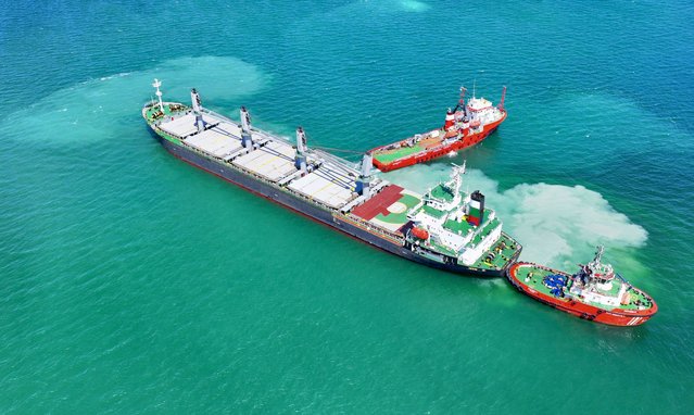 An aerial view of the site as a dry cargo ship that ran aground after anchoring off Yesilkoy, while en route from Russia to Tunisia as the Coastal Safety General Directorate (KEGM) teams continue its rescue operations in Istanbul, Turkiye on June 30, 2024. (Photo by Tayyib Hosbas/Anadolu via Getty Images)