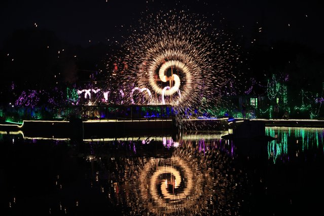 An intangible cultural heritage “strike iron flower” is being displayed at Xi'an Botanical Garden in Xi'an, China, on July 31, 2024. (Photo by Costfoto/NurPhoto/Rex Features/Shutterstock)