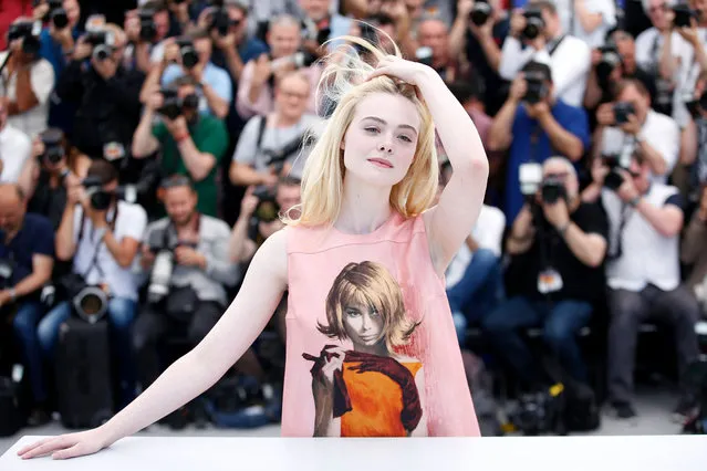 US actress Elle Fanning poses during the photocall for “How to Talk to Girls at Parties” at the 70th annual Cannes Film Festival, in Cannes, France, 21 May 2017. The movie is presented out of competition at the festival which runs from 17 to 28 May. (Photo by Sebastien Nogier/EPA)
