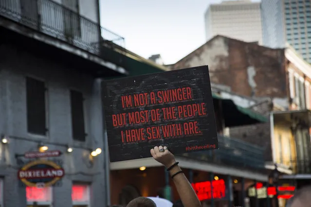 A provocative sign is displayed during the Sexual Freedom Parade, part of Naughty in N'awlins held in New Orleans, Louisiana, Wednesday July 5th, 2017. (Photo by Mathew Growcoot/News Dog Media)