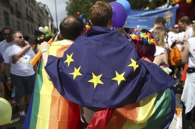 A participant wears a European Union flag during the annual Pride London Parade, which highlights issues of the gay, lesbian and transgender community, in London, Britain  June 25, 2016. (Photo by Neil Hall/Reuters)