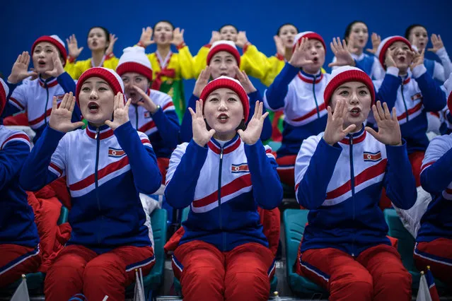 North Korean cheerleaders perform during the Women's Ice Hockey Preliminary Round Group B game between Korea and Japan on day five of the PyeongChang 2018 Winter Olympics at Kwandong Hockey Centre on February 14, 2018 in Gangneung, South Korea. Strong winds have caused a number of events to be rescheduled at the PyeongChang Winter Olympics including the biathlon and Alpine skiing competitions. (Photo by Carl Court/Getty Images)