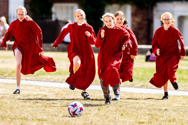 Girl choristers from Exeter Cathedral, UK fine tune their football skills inspired by the England Lionesses football team on July 8, 2025. The Lionesses have a crunch match tomorrow (Wed 9th July) against the Netherlands which might decide their fate in the UEFA European Women's Championship. (Photo by Mark Passmore)