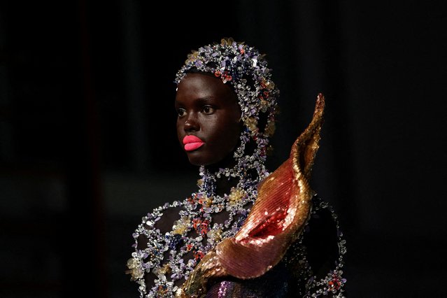 A model presents a creation by designer Kevin Germanier as part of his Haute Couture Fall/Winter 2025-2026 collection show for fashion house Germanier in Paris, France, on July 10, 2025. (Photo by Tom Nicholson/Reuters)