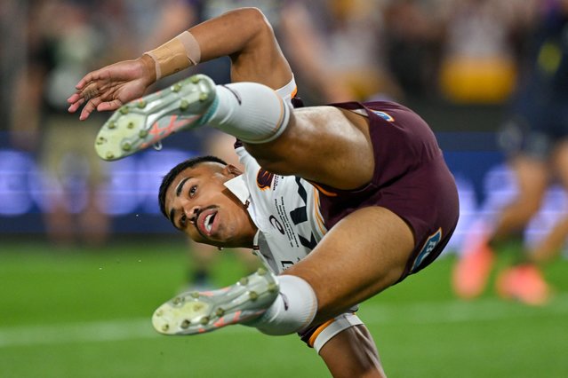 Brisbane Broncos' Deine Mariner scores a try during the National Rugby League (NRL) Grand Final match between the Melbourne Storm and Brisbane Broncos at Accor Stadium in Sydney on October 5, 2025. (Photo by Izhar Khan/AFP Photo)