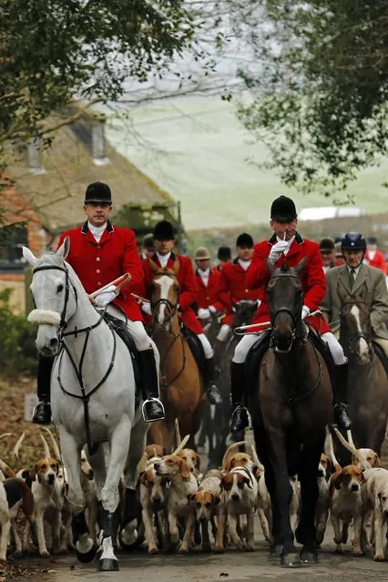 Members of the Old Surrey Burstow and West Kent Hunt ride to Chiddingstone Castle for the annual Boxing Day hunt in Chiddingstone, south east England December 26, 2014. (Photo by Luke MacGregor/Reuters)