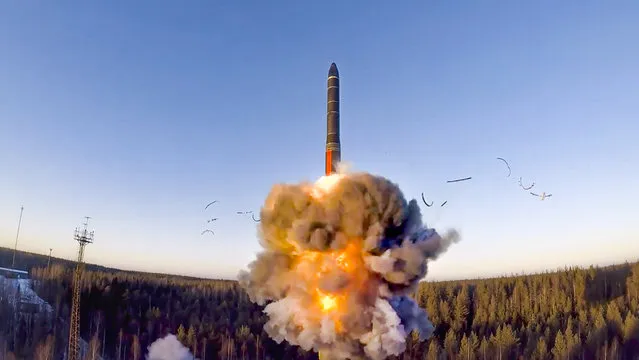 In this photo taken from a video distributed by Russian Defense Ministry Press Service, on Wednesday, December 9, 2020, Russian a rocket launches from missile system as part of the drills, a ground-based intercontinental ballistic missile was launched from the Plesetsk facility in northwestern Russia. The Russian military has conducted sweeping drills of its strategic nuclear forces that featured several practice missile launches. (Photo by Russian Defense Ministry Press Service via AP Photo)