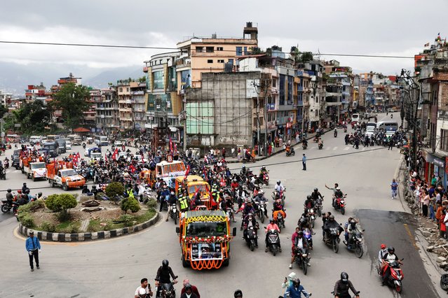 People take part in a tribute rally with the coffins carrying the bodies of people, who died in last week's anti-corruption protests that toppled the government, in Kathmandu, Nepal, on September 16, 2025. (Photo by Navesh Chitrakar/Reuters)