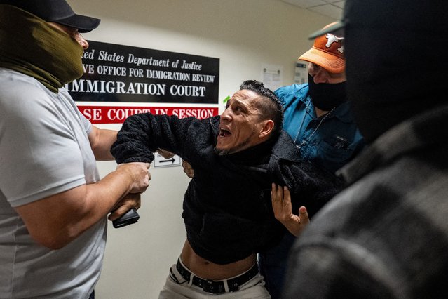 U.S. Immigration and Customs Enforcement (ICE) agents and federal officers detain a migrant as he walks out from a hearing during targeted detainment at a U.S. immigration court in Manhattan, New York City on October 27, 2025. (Photo by David 'Dee' Delgado/Reuters)