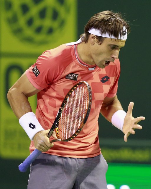 Spain's David Ferrer reacts against Croatia's Ivo Karlovic during their semi-final tennis match at the Qatar Open tennis tournament in Doha January 9, 2015. (Photo by Mohammed Dabbous/Reuters)