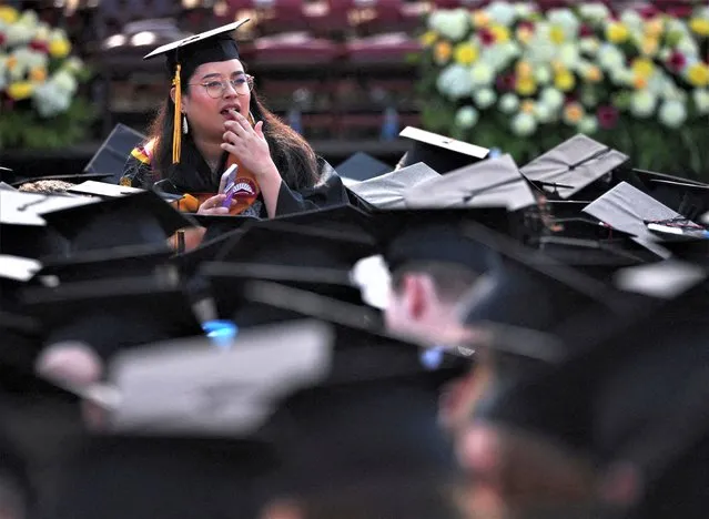 Graduating students gather for Commencement ceremonies at Boston College in Chestnut Hill, Massachusetts, U.S., May 22, 2023. (Photo by Brian Snyder/Reuters)