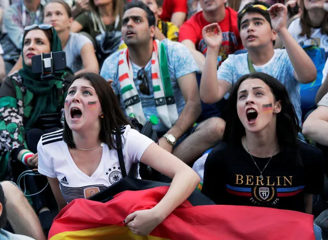 Germany fans react as they follow the game between Germany and Mexico on a giant screen at the Fifa Fans Fest in Saint Petersburg on June 17, 2018 during the Russia 2018 football World Cup tournament. (Photo by Henry Romero/Reuters)