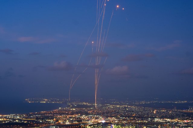 Israeli Iron Dome air defense system fires to intercept rockets that were launched from Lebanon, as seen from Haifa, northern Israel, Monday, September 23, 2024. (Photo by Baz Ratner/AP Photo)