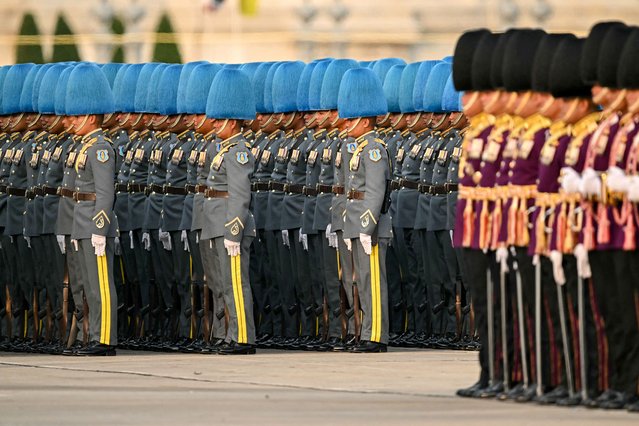 Thai Royal Guards take part in the “Trooping the Colour” parade and oath-giving ceremony to mark the 72nd birthday celebrations of Thailand's King Maha Vajiralongkorn at the Dusit Palace in Bangkok on December 3, 2024. The ceremony is the first “Trooping the Colour” and associated oath-giving in 16 years and the first of such ceremonies to be held during the reign of Thailand's King Maha Vajiralongkorn. (Photo by Manan Vatsyayana/AFP Photo)