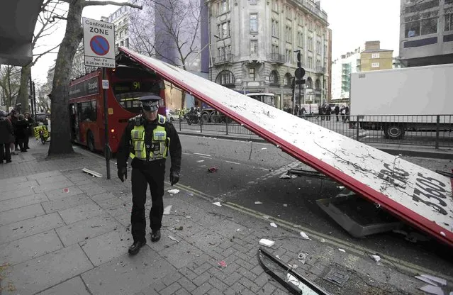 Emergency services work at the scene of a bus accident on the Kingsway in central London February 2, 2015. (Photo by Peter Nicholls/Reuters)