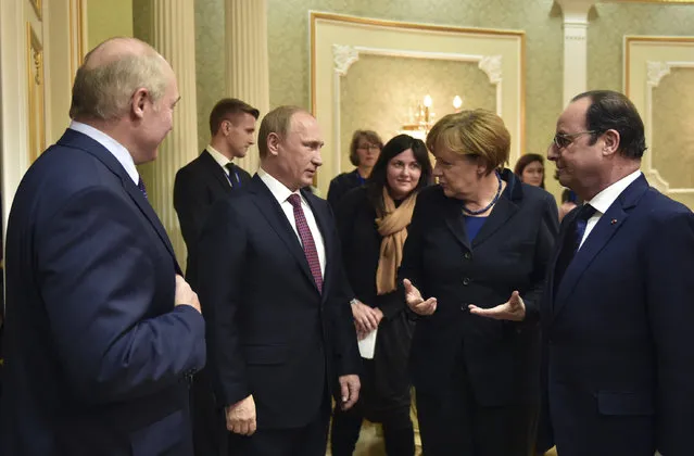 Russia's President Vladimir Putin (2nd L), Germany's Chancellor Angela Merkel (2nd R) and France's President Francois Hollande (R) attend a meeting on resolving the Ukrainian crisis, with Belarus' President Alexander Lukashenko (L) seen nearby, in Minsk, February 11, 2015. (Photo by Mykola Lazarenko/Reuters)