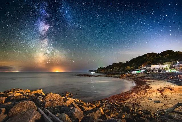 A spectacular view of the stars during a clear night sky at Steephill Cove on the Isle of Wight in England on September 21, 2022. (Photo by Island Visions/Bournemouth News)
