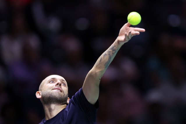 Daniel Evans of Great Britain serves in the Australia v Great Britain Match 2 against Alex De Minaur of Australia during day two of the Davis Cup Finals Group Stage Manchester at AO Arena on September 13, 2023 in Manchester, England. (Photo by Nathan Stirk/Getty Images for LTA)