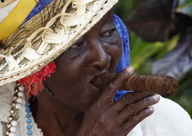 A street entertainer waits for tourists in Havana, October 2009. (Photo by Desmond Boylan/Reuters)