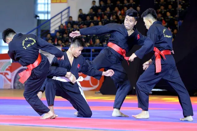 Athletes perform during a martial arts show to welcome Indonesian President Joko Widodo (not pictured) at Quan Ngua sport center, in Hanoi, Vietnam 12 January 2024. Widodo is on an official visit to Vietnam from 11 to 13 January 2024. (Photo by Luong Thai Linh/EPA)