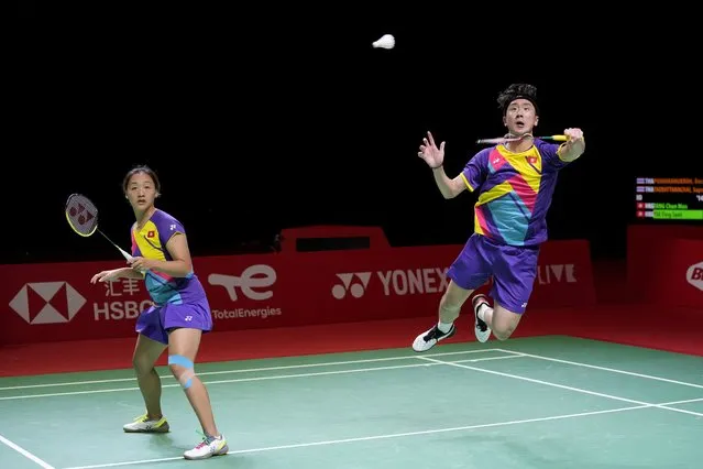 Hong Kong's Tang Chun Man, right, and Tse Ying Suet compete against Thailand's Dechapol Puavaranukroh and Sapsiree Taerattanachai during their mixed doubles badminton group stage match at the BWF World Tour Finals in Nusa Dua, Bali, Indonesia, Thursday, December 2, 2021. (Photo by Dita Alangkara/AP Photo)
